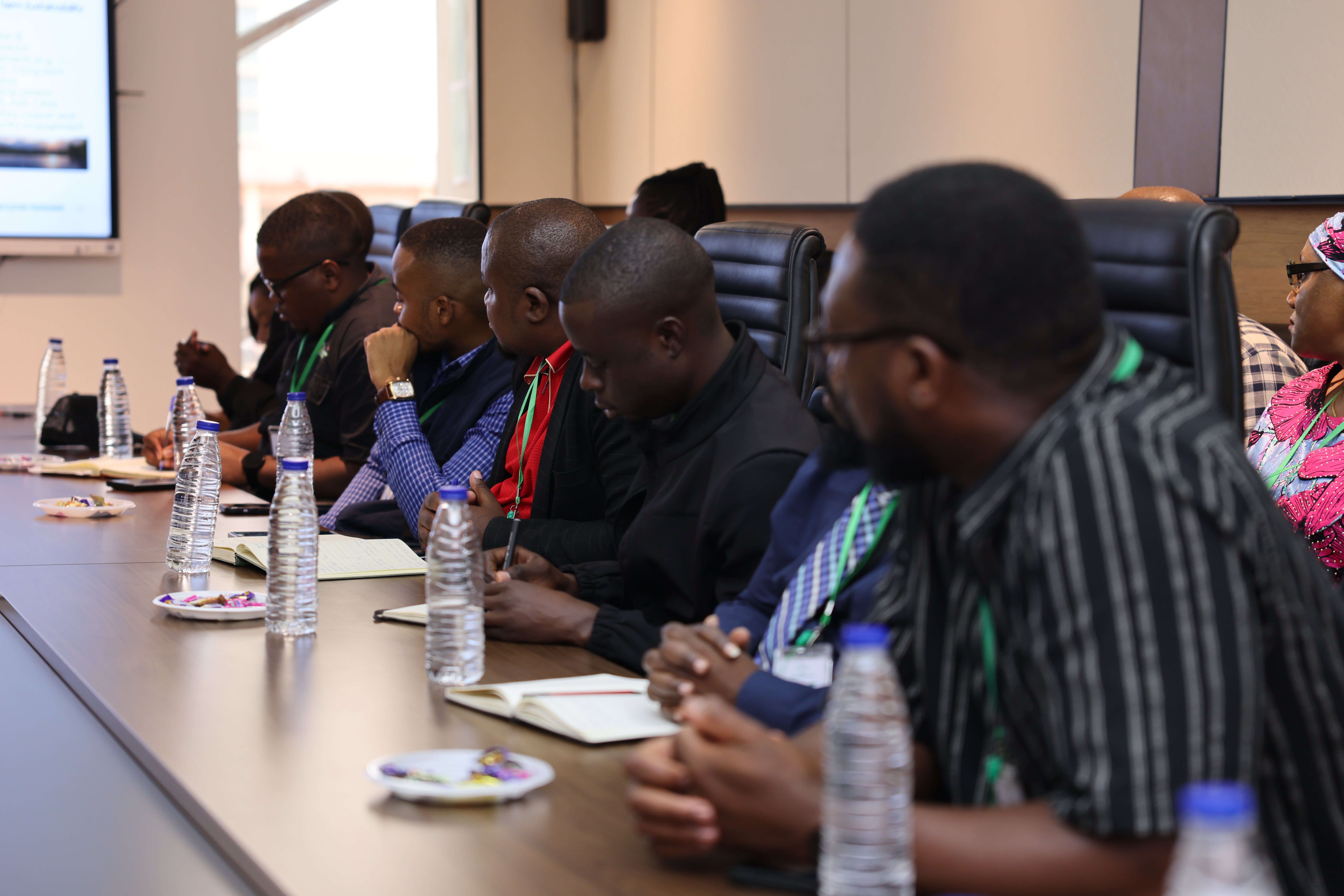 Zambia delegation follows a presentation by the REA-NEP Project Management Unit