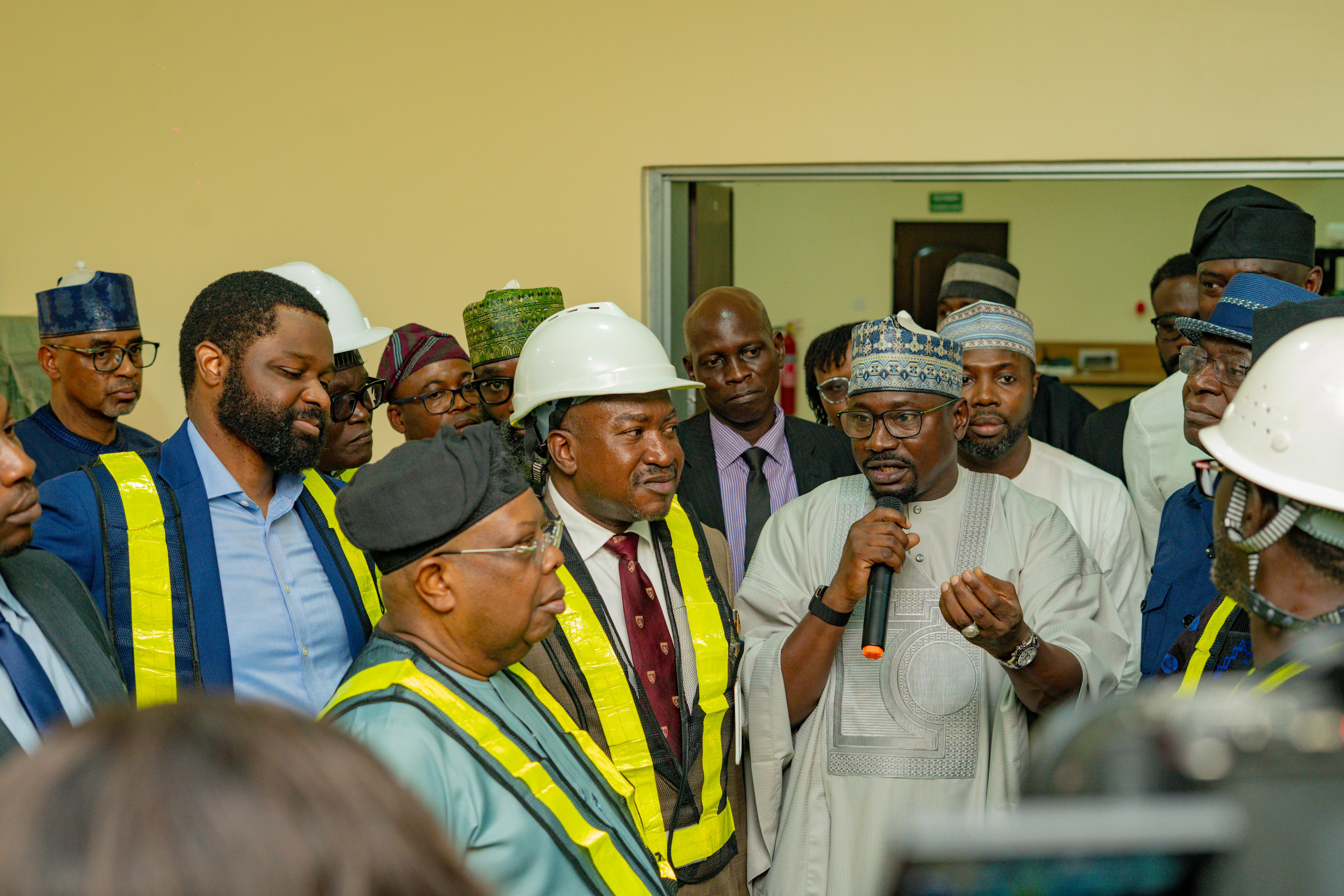 Figure 4 Abba Aliyu, Managing Director/CEO, Rural Electrification Agency, addresses the Honourable Minister of Power, Joseph O. Tegbe, and other dignitaries during a visit to the Renewable Workshop Training Centre at Yakubu Gowon University following the commissioning of the 3MW Solar Hybrid Power Project under the Energizing Education Programme Phase II on 16 September 2026.