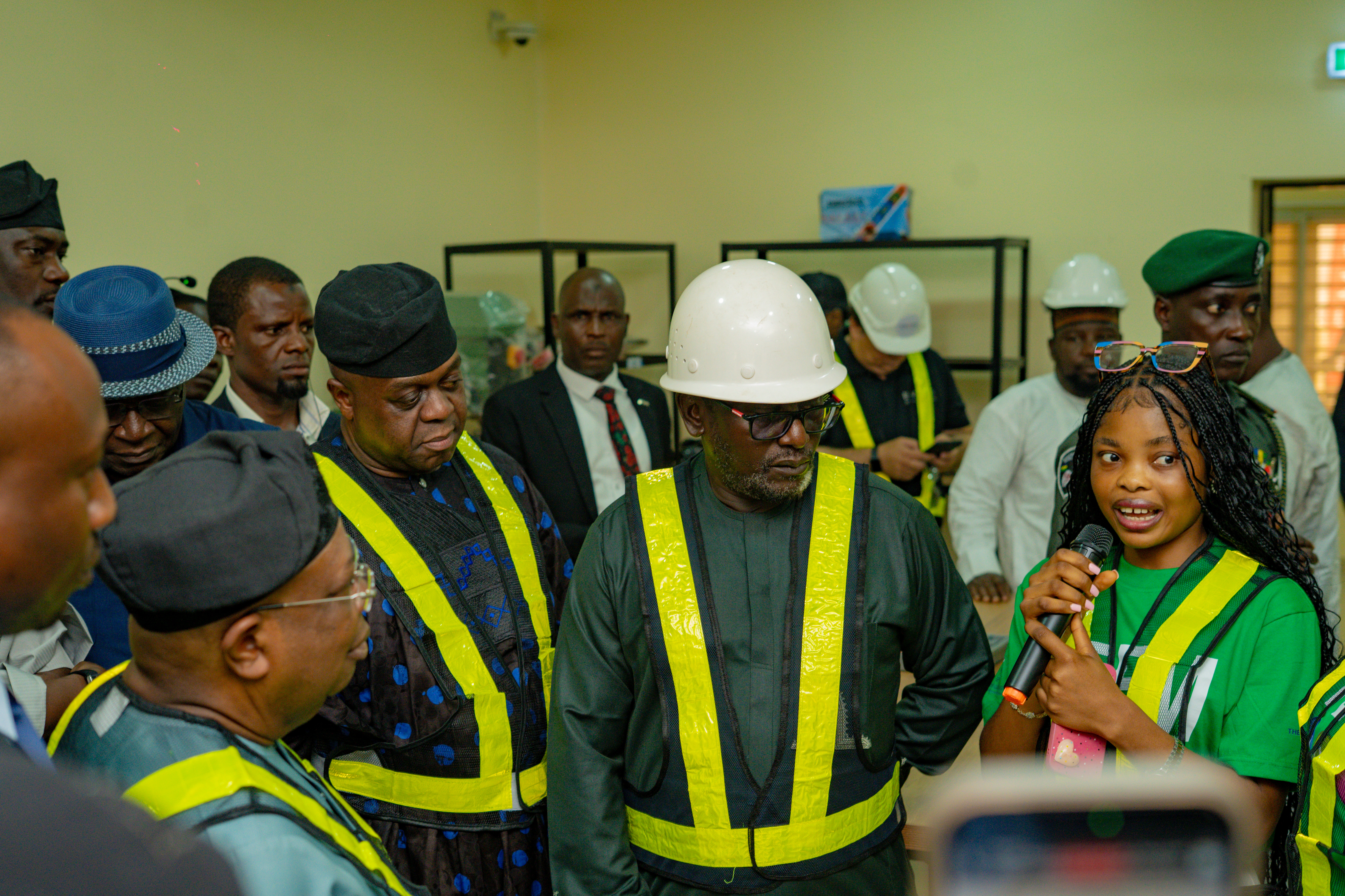 Figure 8 Peace Terna, a STEM intern under the Female STEM Internship Programme, shares her experience with the Honourable Minister of Power, Joseph O. Tegbe, and other dignitaries during the site walkthrough at Yakubu Gowon University. The internship is a component of the Energizing Education Programme Phase II.